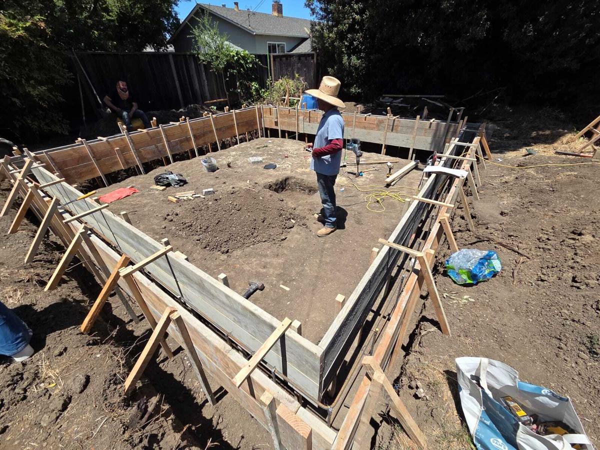 Site excavation and foundation work underway